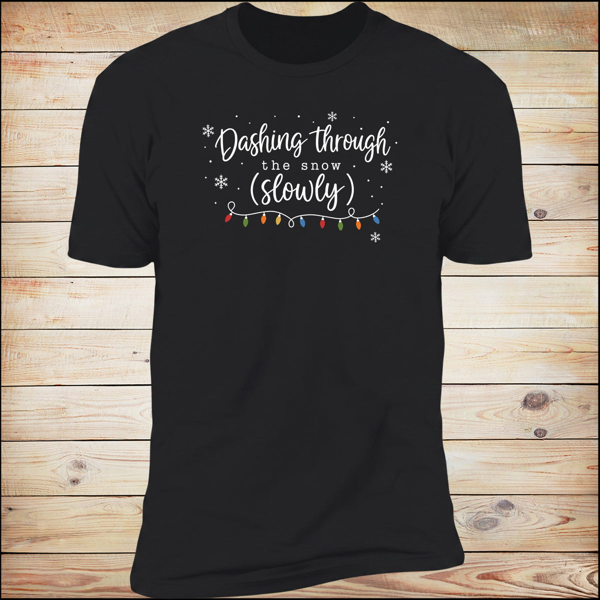 Dashing Through The Snow (Slowly) tee in Black on wood